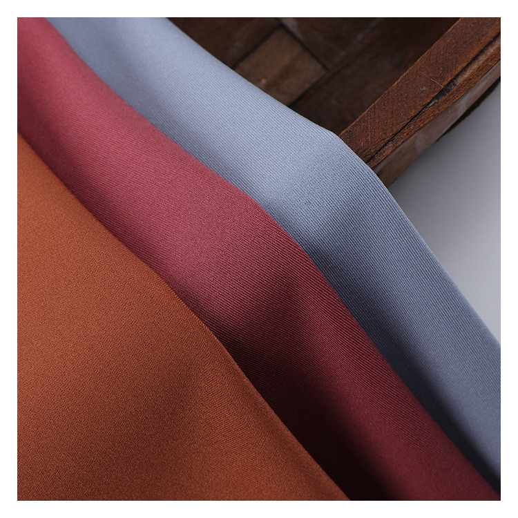 High Elastic 85% Polyester 15% Spandex Warp Knitted Polyester Swimwear Fabric for Swimwear Garment